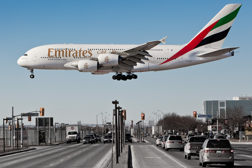 EMIRATES A380 CROSSING A HIGHWAY ON APPROACH FOR LANDING