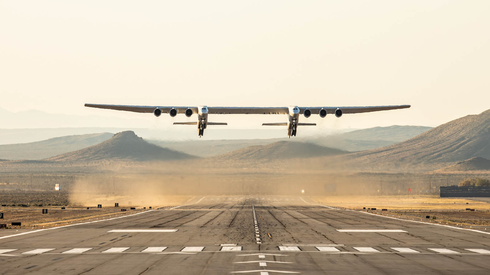 A PICTURE OF THE STRATOLAUNCH AIRCRAFT TAKING FLIGHT
