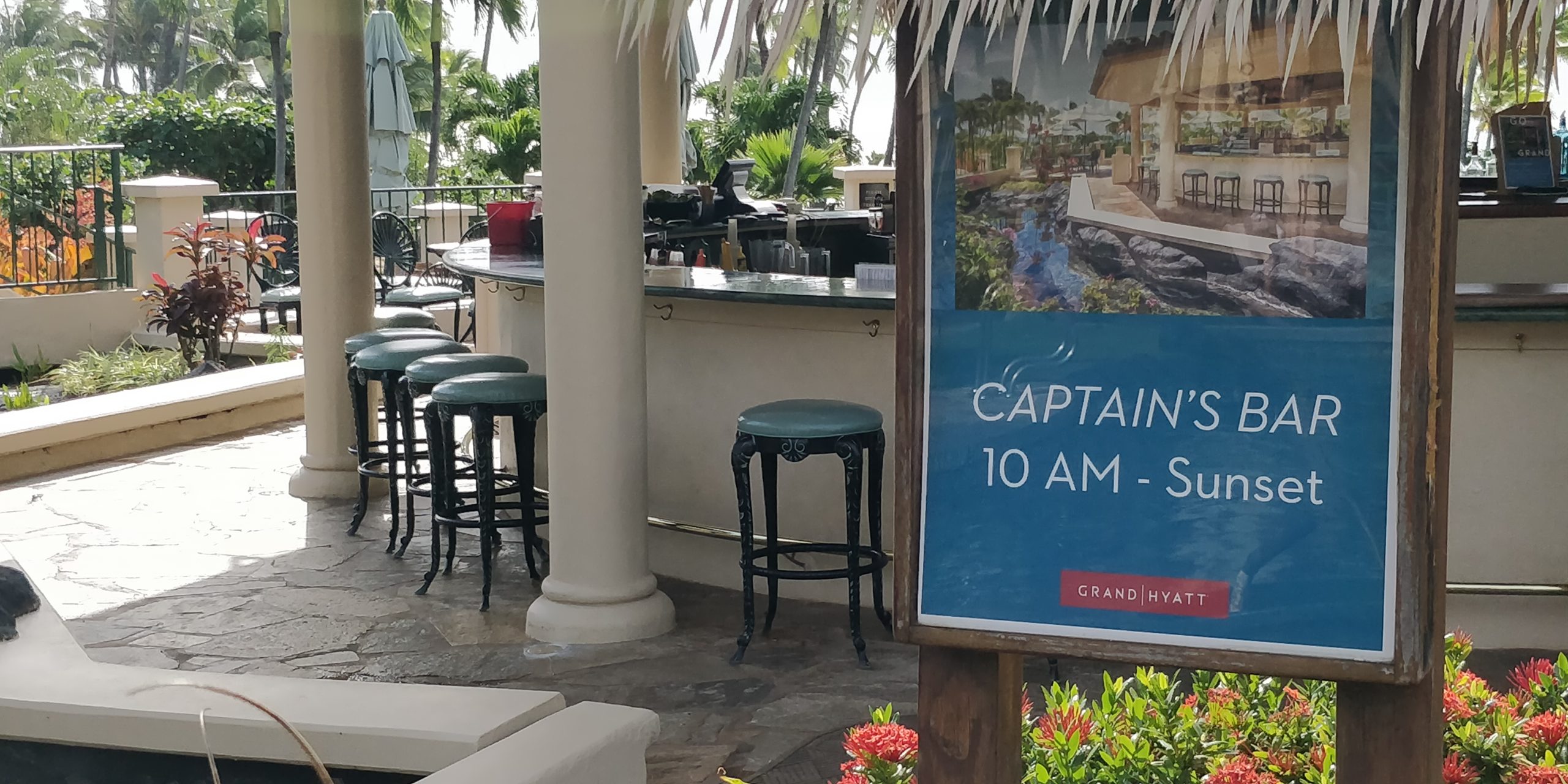 A PICTURE OF THE CAPTAIN'S BAR OVERLOOKING THE POOLS