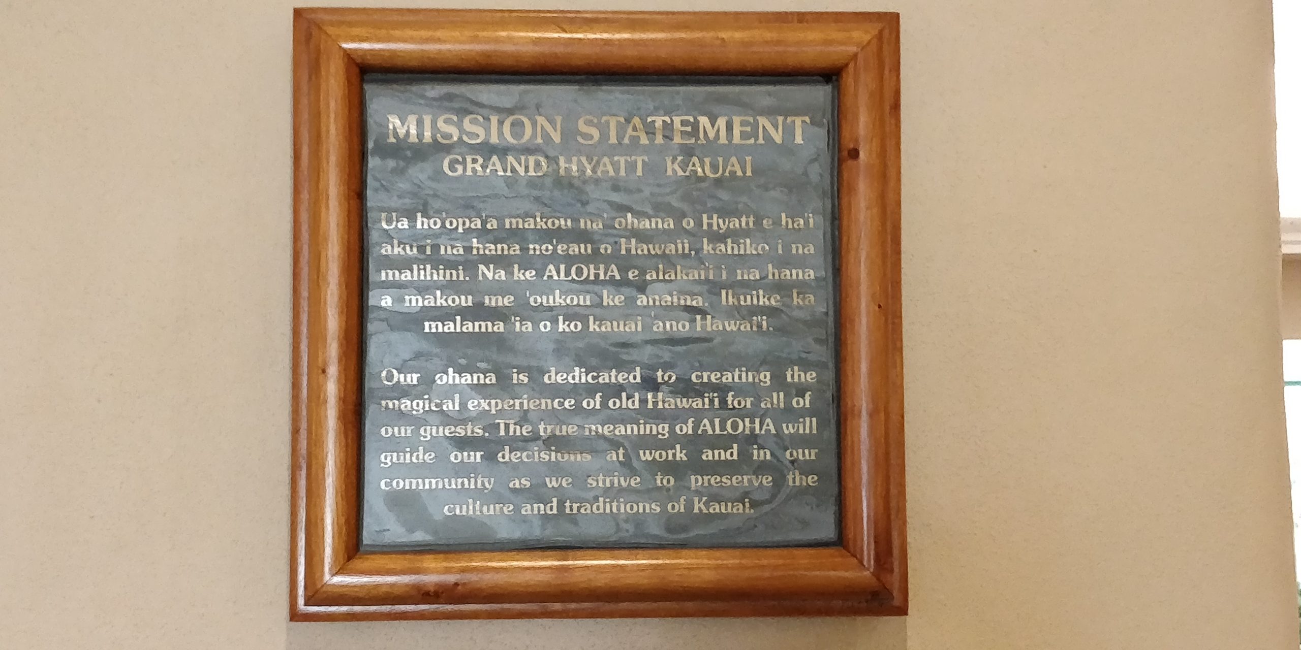 PICTURE OF THE PLAQUE DESCRIBING HOTEL'S MISSION STATEMENT