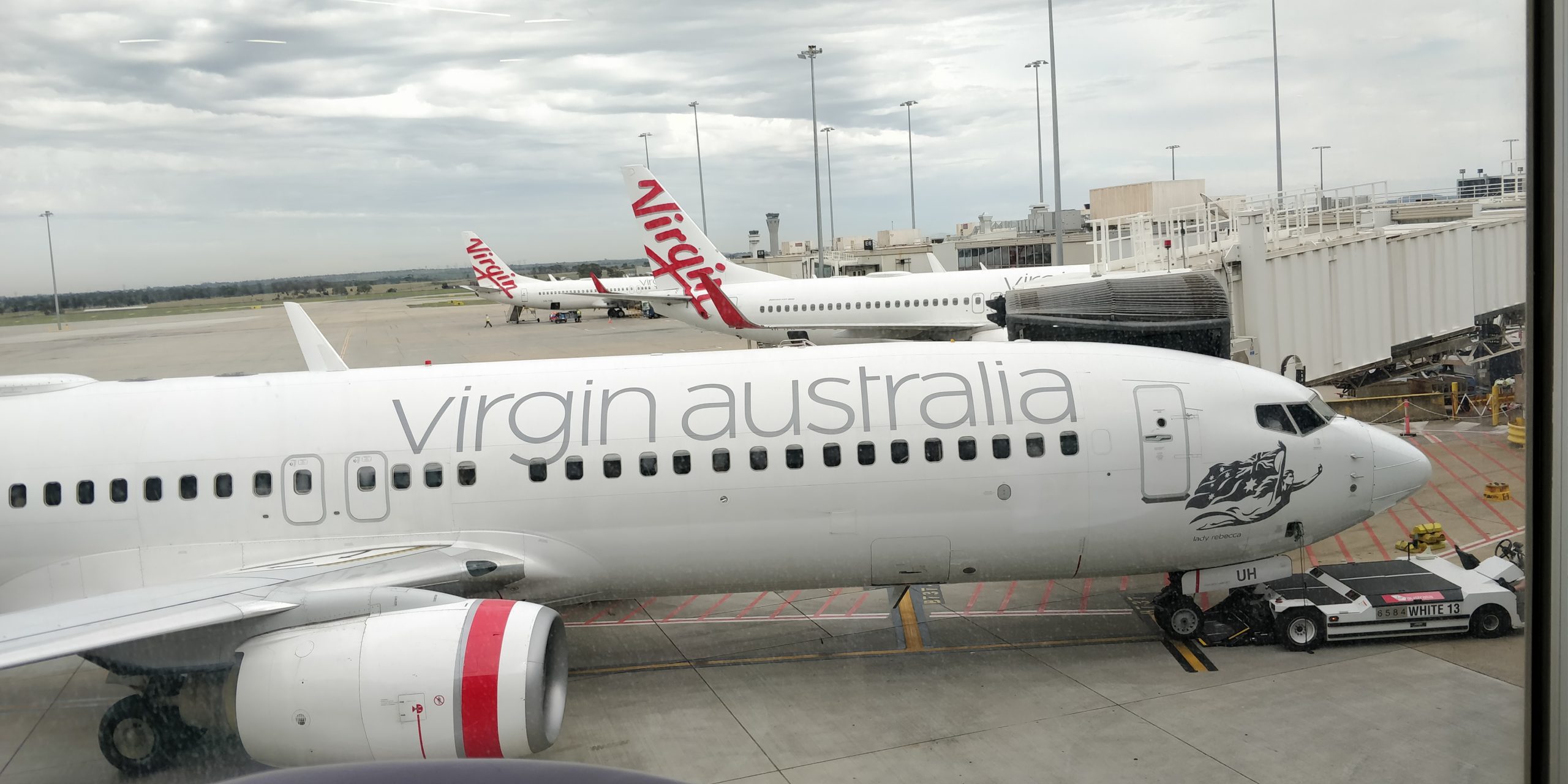 PICTURE OF A VIRGIN AUSTRALIA 737 AT THE GATE IN MELBOURNE
