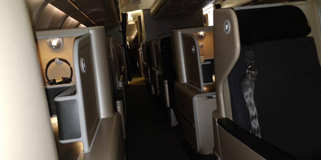 PICTURE OF A DARK BUSINESS CLASS SECTION OF THE A330