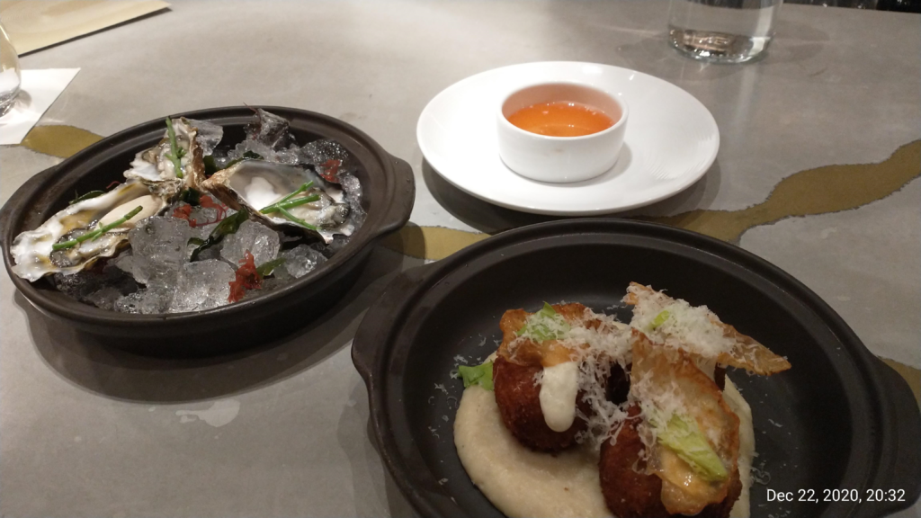 picture of the starters. oysters and short rib arancini