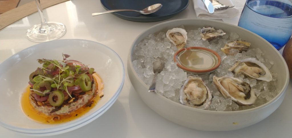picture of the baked oysters and salmon tartare.