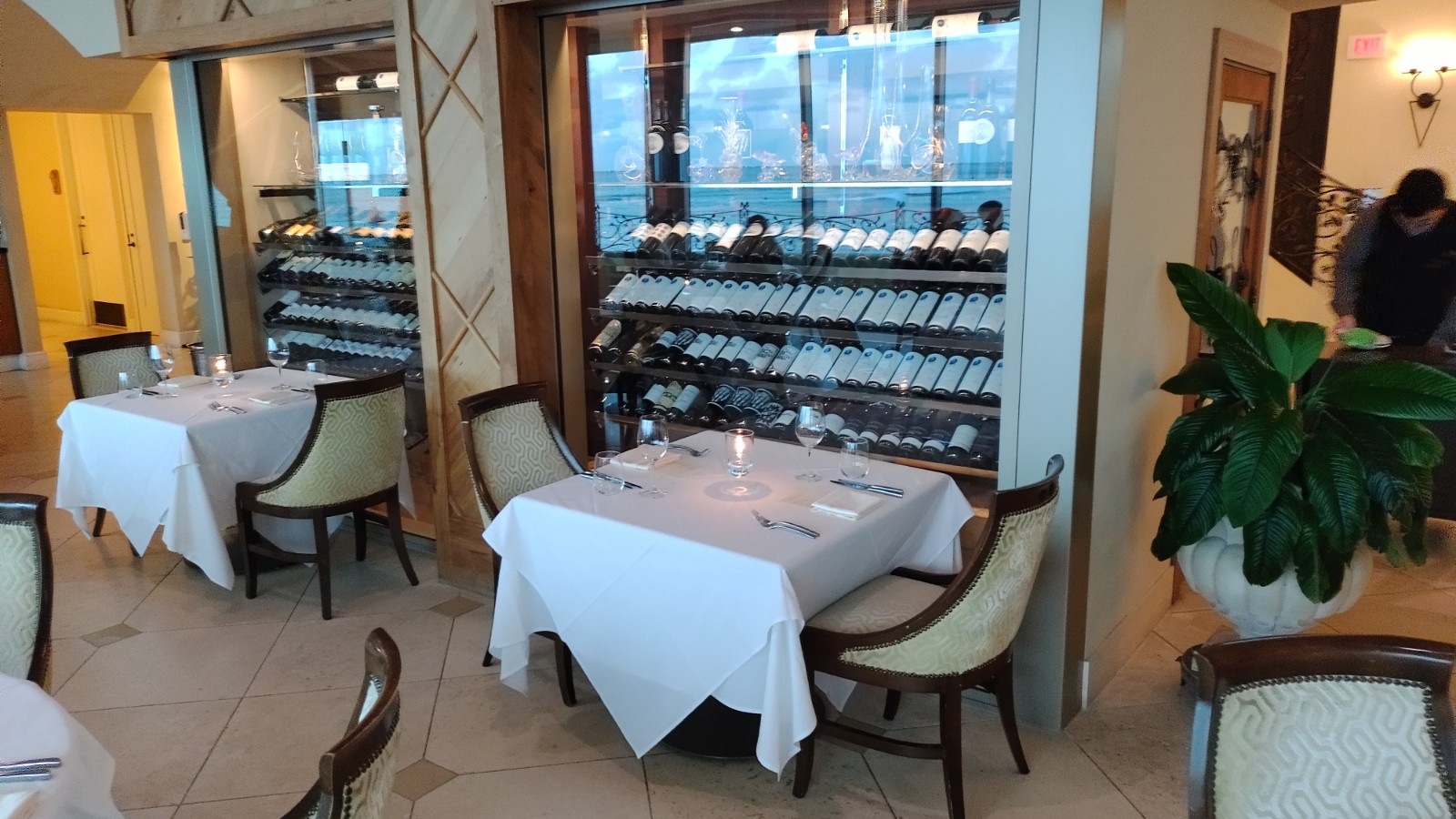 PICTURE OF THE DINING ROOM WINE RACK.