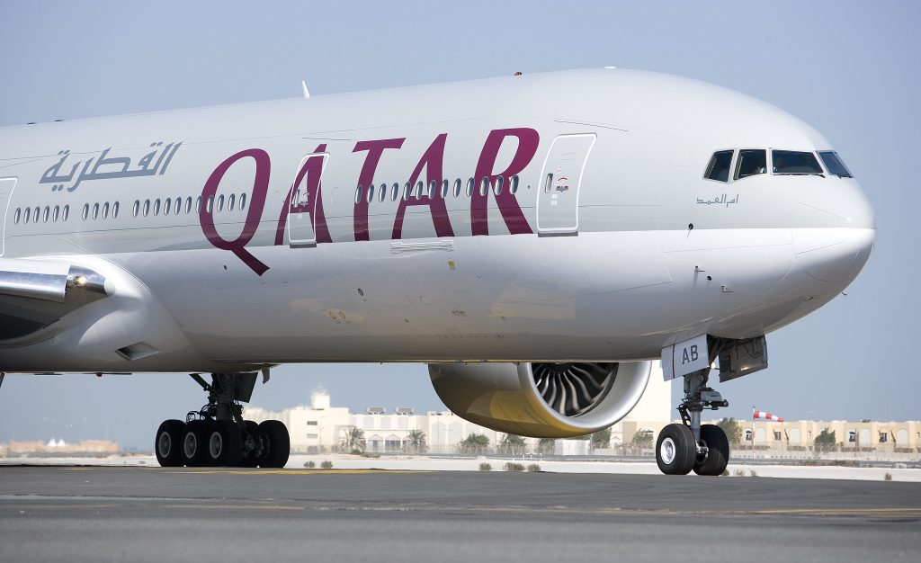 PICTURE OF A QATAR AIRWAYS A350 PARKED ON THE RAMP.