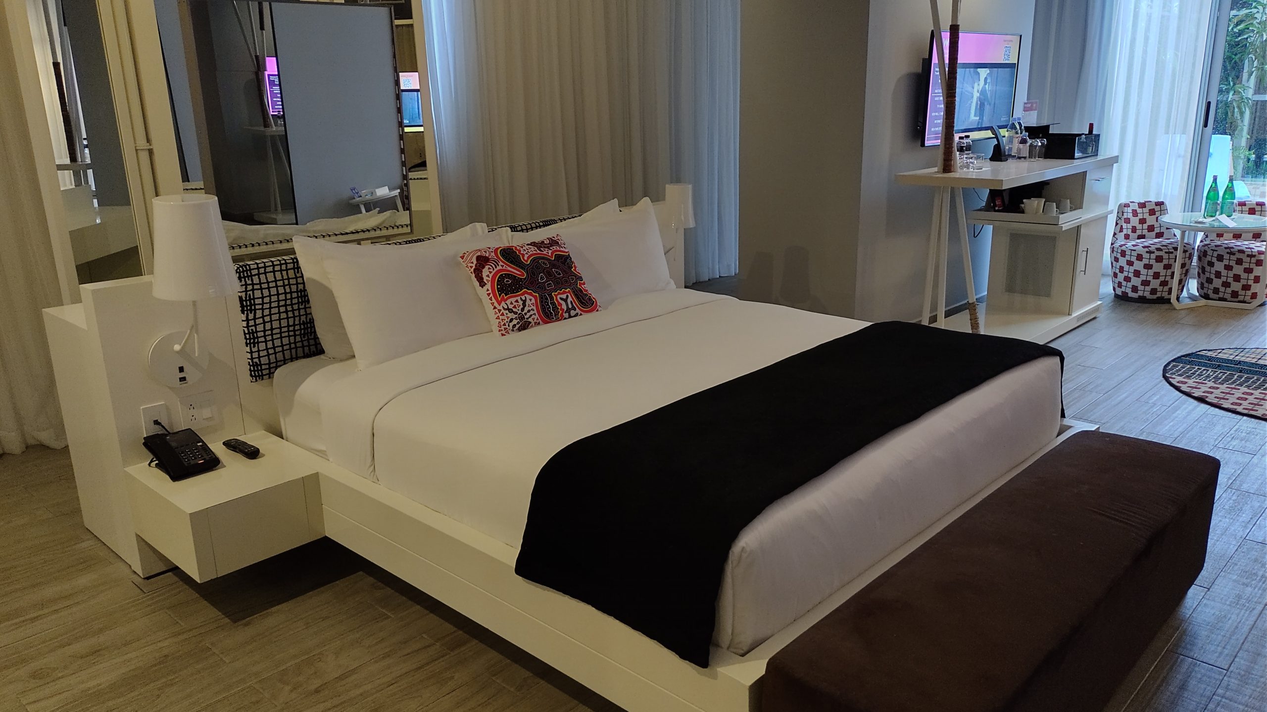 picture of the bed in the room.