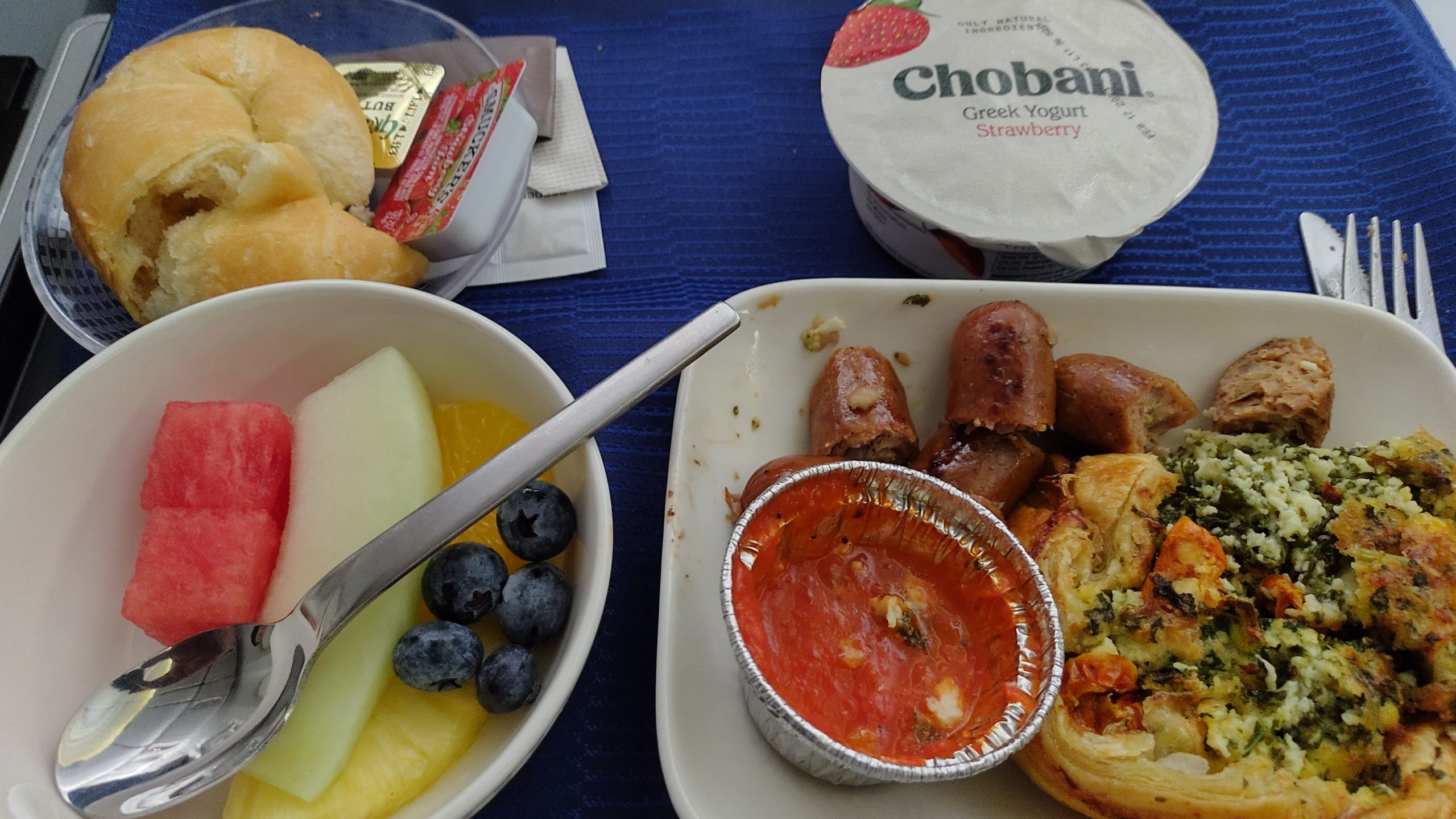 picture of the egg and spinach omelet  with yogurt and fruit bowl 