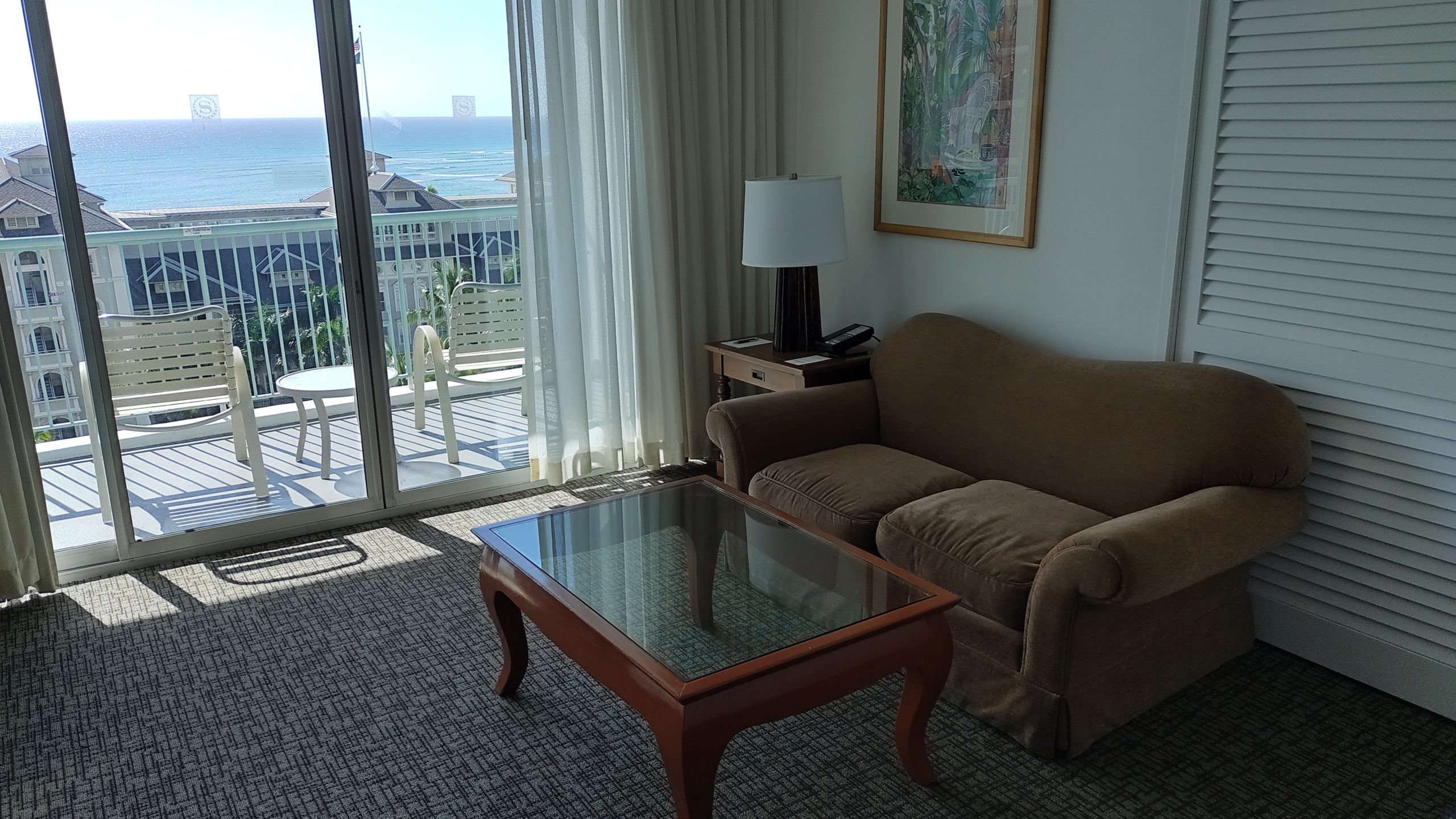picture of the living room and main lanai showing ocean view.
