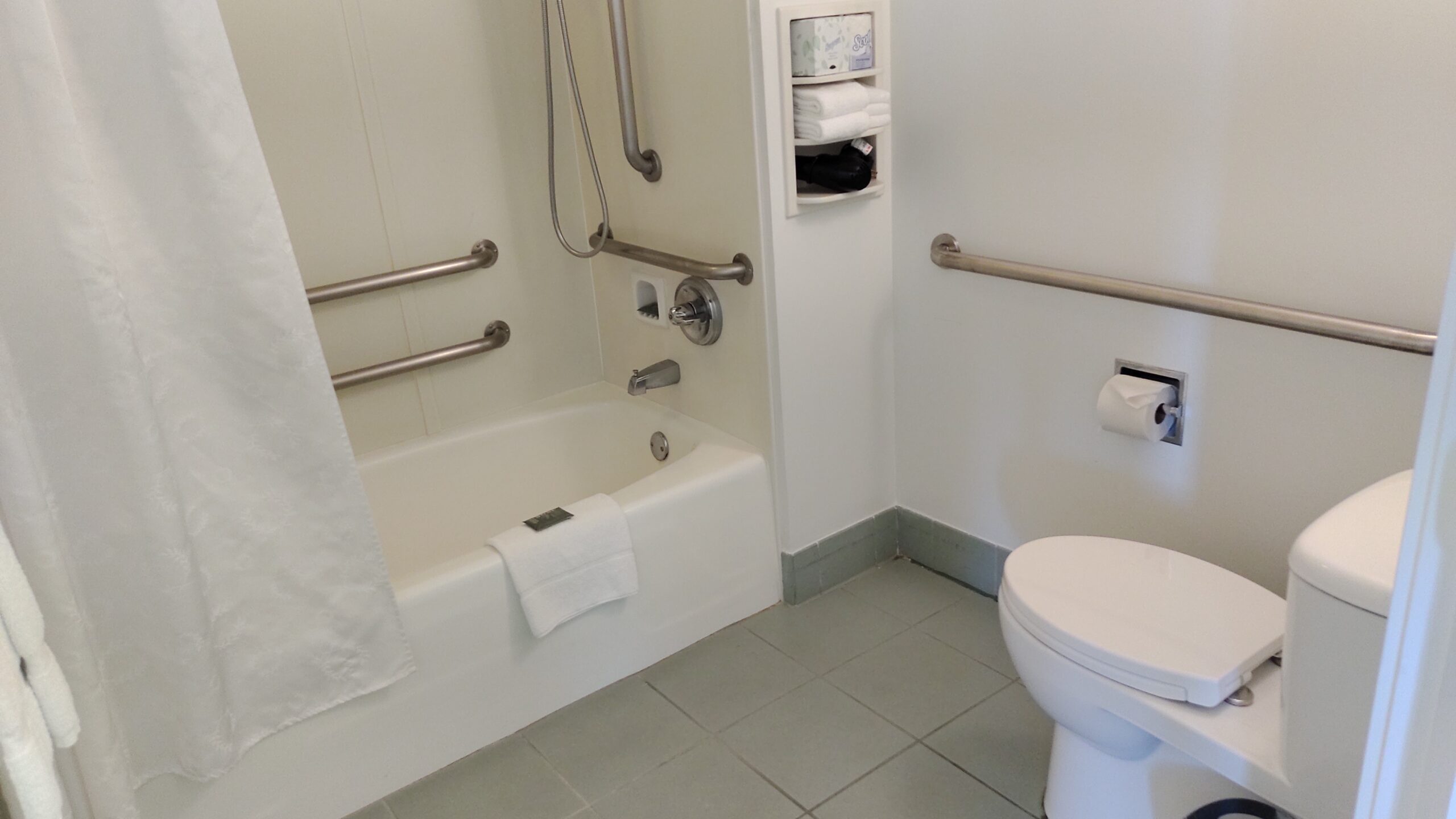 picture of the tub and toilet area.