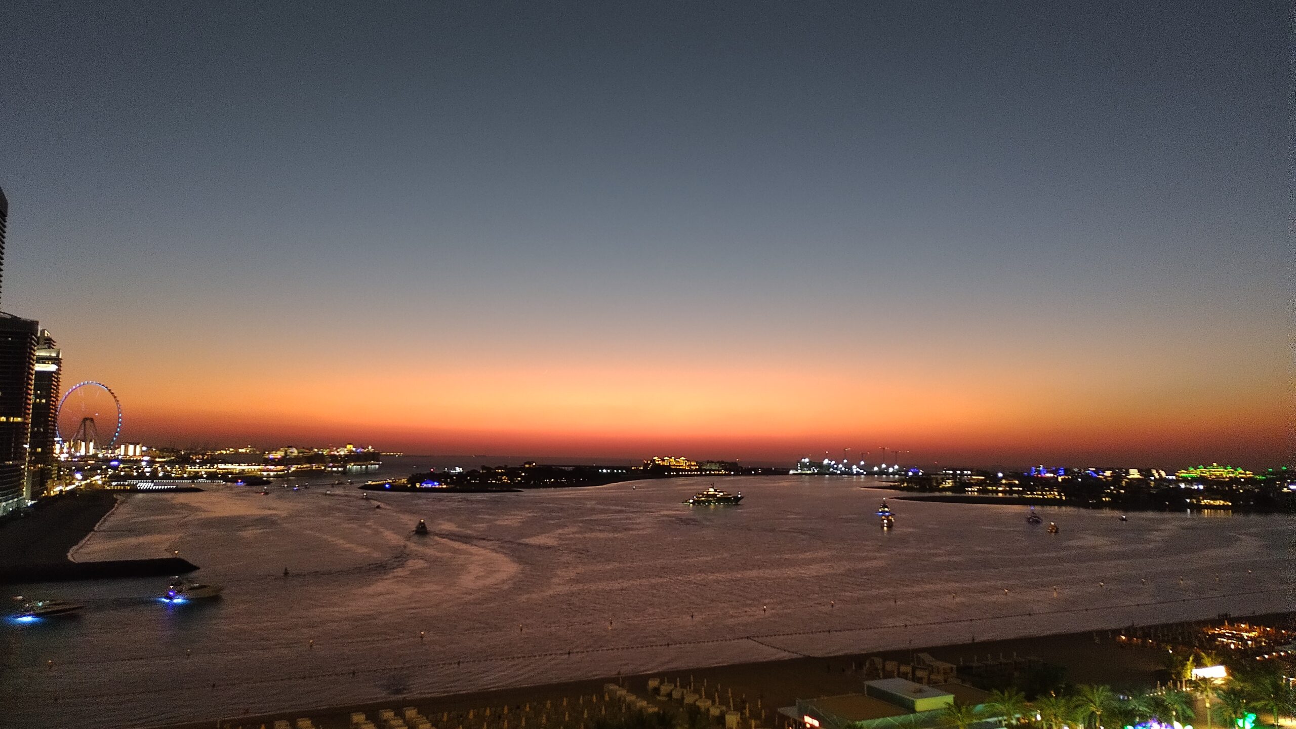 PICTURE OF THE CRIMSON GLOW AFTER SUNSET OVER THE HARBOUR.