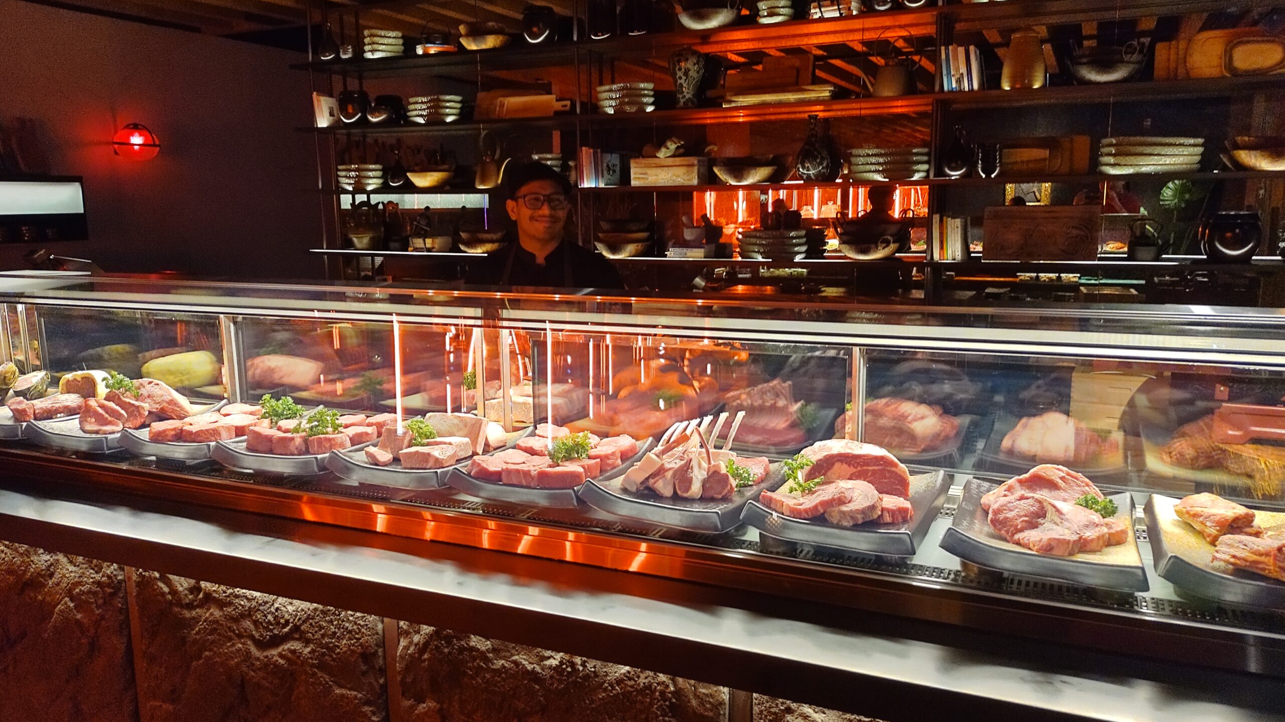 PICTURE OF THE BUTCHER SHOP AS YOU ENTER THE RESTAURANT.