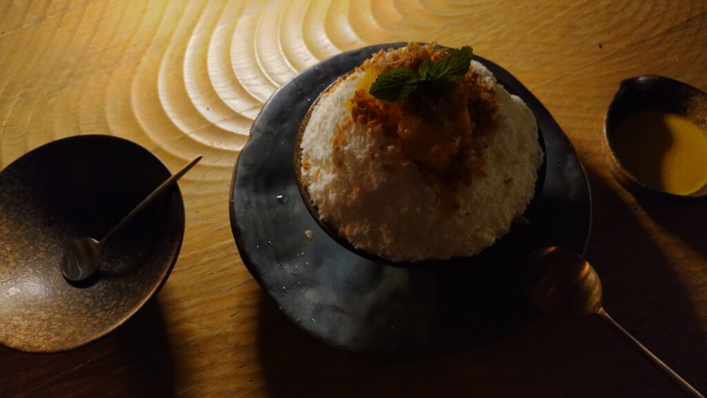 PICTURE OF THE MANGO BINGSU. IT'S LIKE A SORBET WHICH WAS SERVED FOR DESSERT.