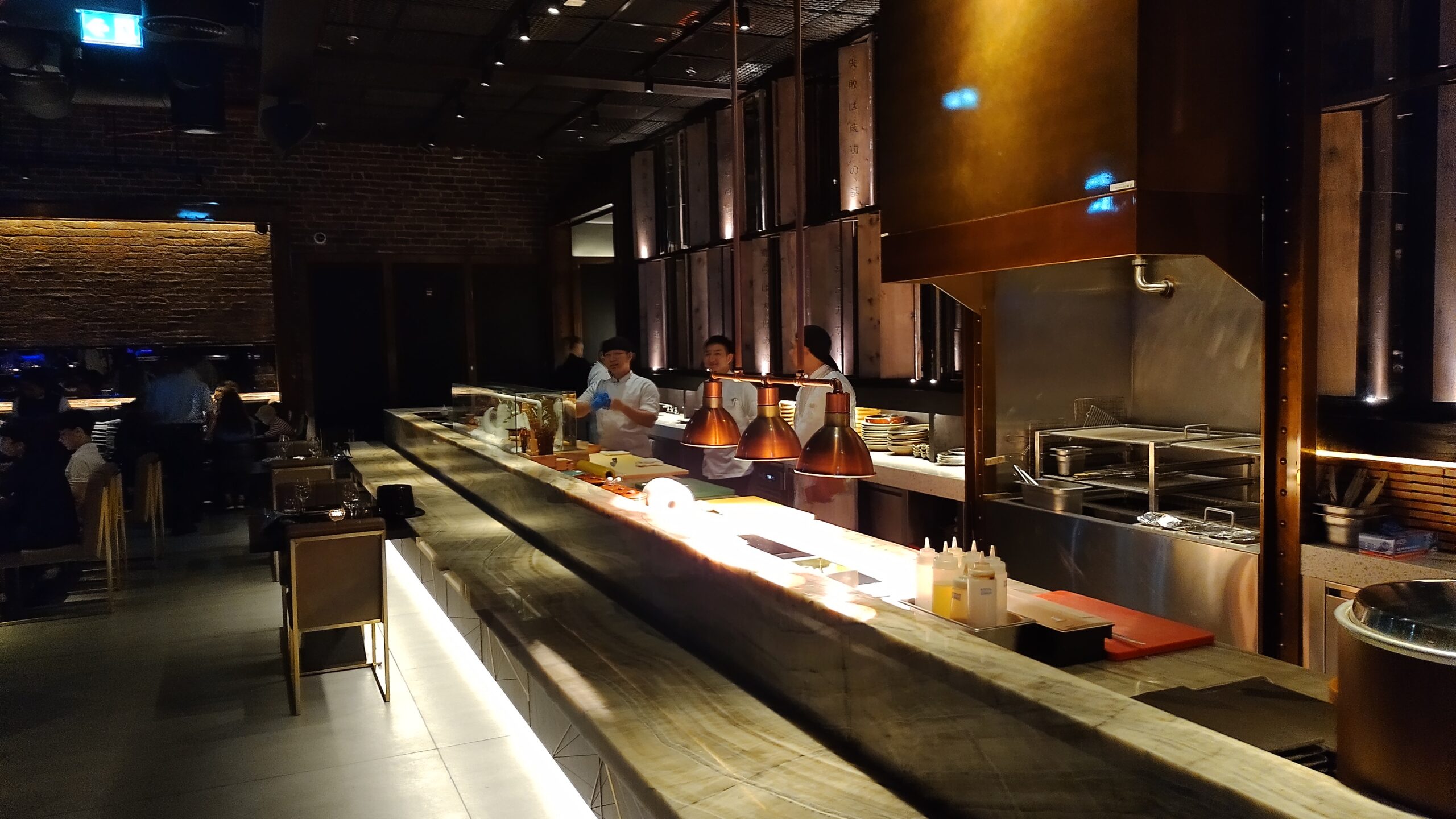 PICTURE OF THE MASSIVE SUSHI BAR AND ROBATA GRILL.