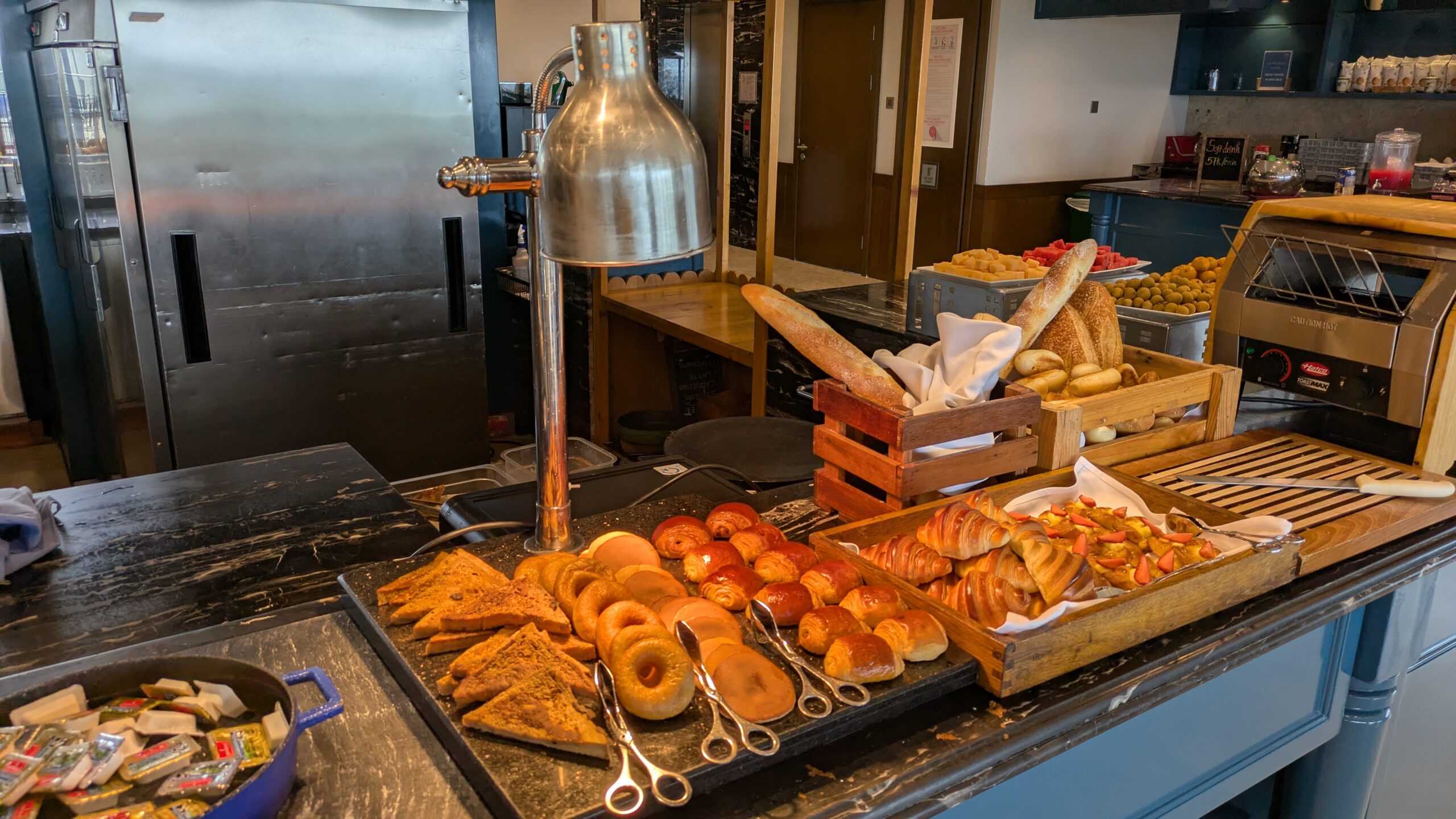 PICTURE OF THE BREAD STATION AT THE BRUNCH.