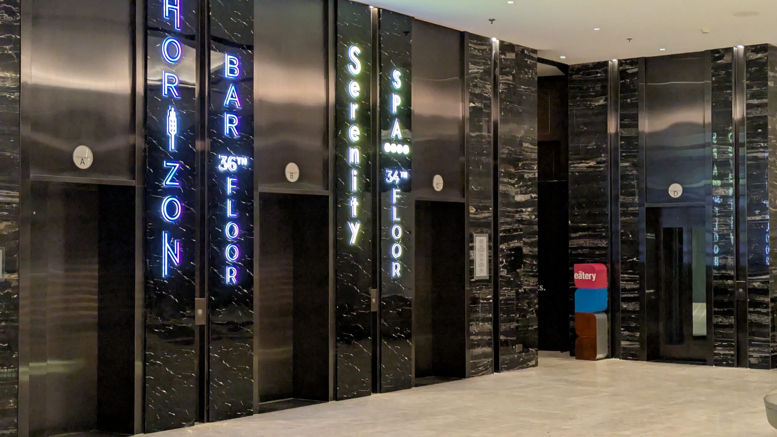 PICTURE OF THE ELEVATORS IN MAIN LOBBY.