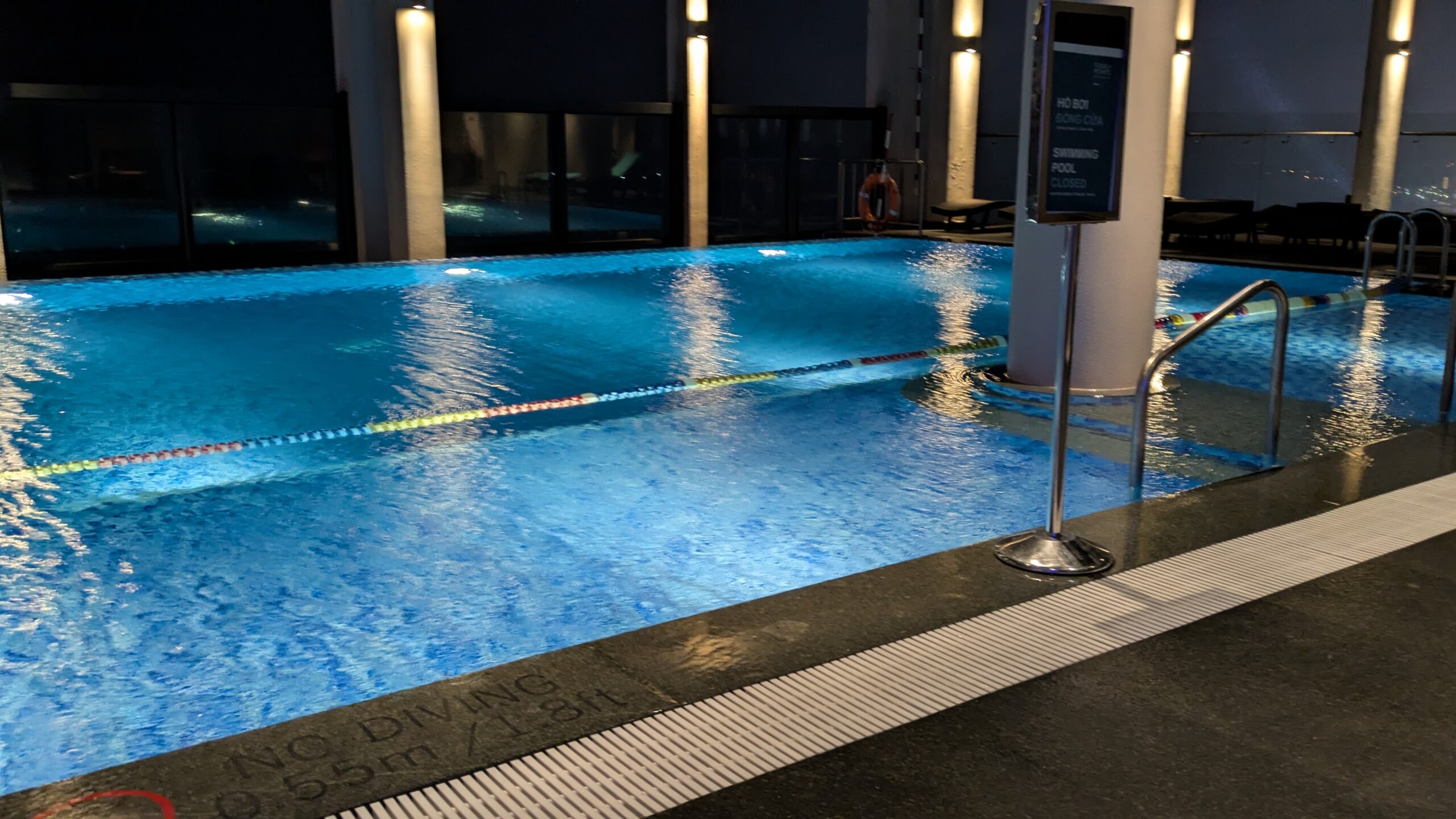 PICTURE OF THE OTHER END OF THE POOL OVERLOOKING THE BEACH STRIP.