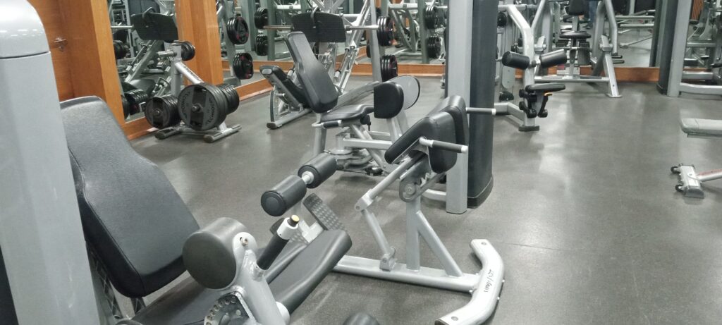 PICTURE OF ANOTHER SECTION OF EQUIPMENT IN THE GYM.